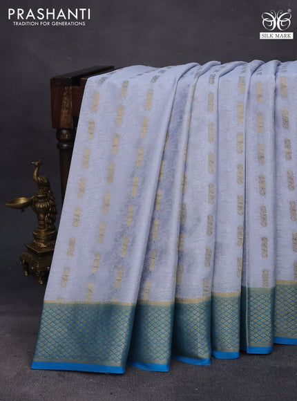 Pure mysore silk saree pastel grey and cs blue with allover self mboss & zari buttas and zari woven border