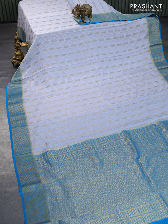 Pure mysore silk saree pastel grey and cs blue with allover self mboss & zari buttas and zari woven border