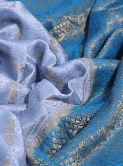 Pure mysore silk saree pastel grey and cs blue with allover self mboss & zari buttas and zari woven border