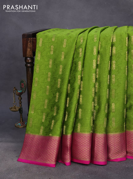 Pure mysore silk saree mehendi green and pink with allover self mboss & zari buttas and zari woven border