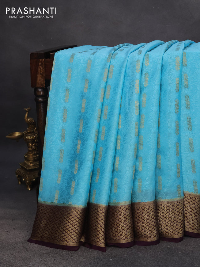 Pure mysore silk saree light blue and wine shade with allover self mboss & zari buttas and zari woven border