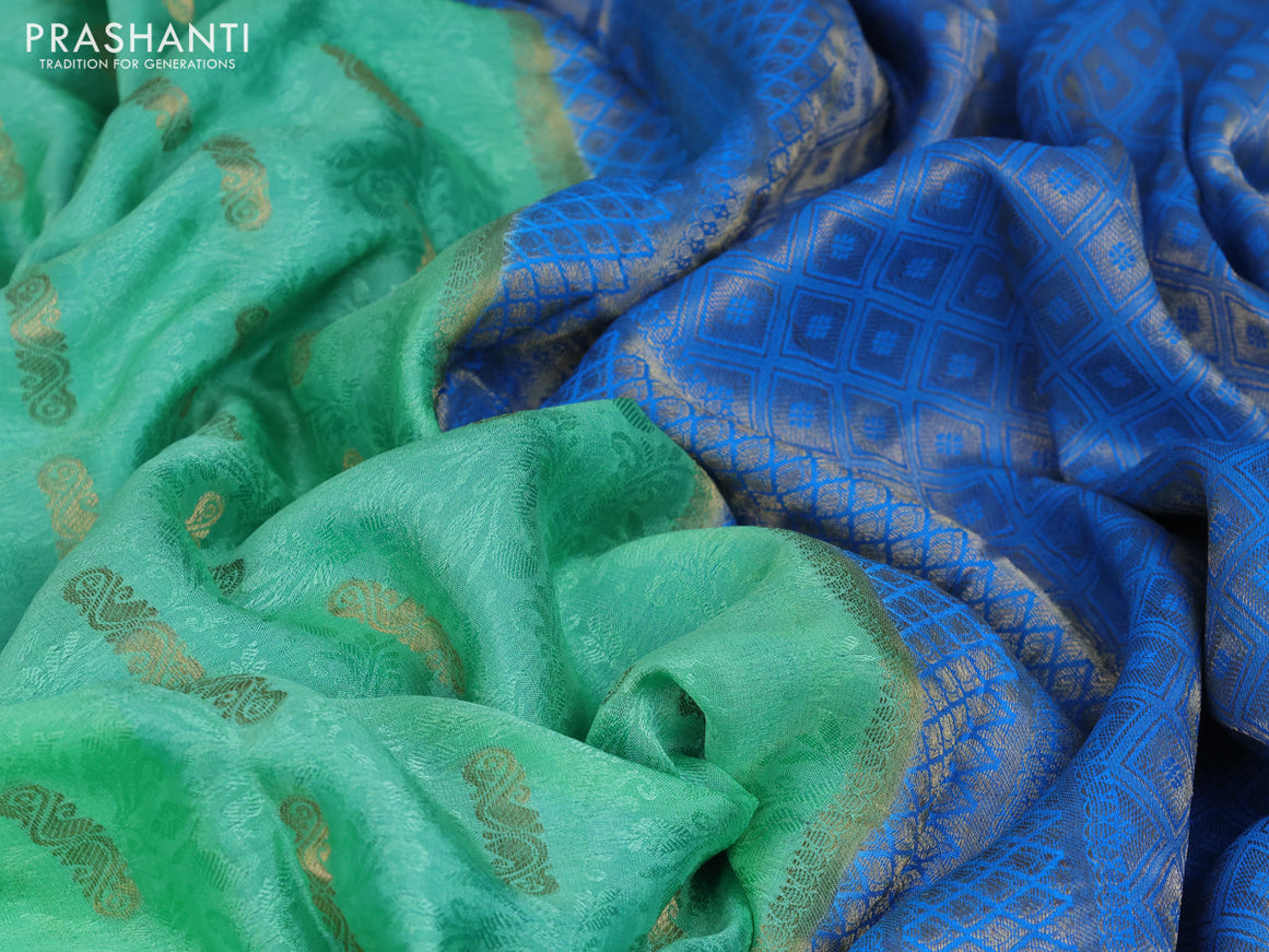 Pure mysore silk saree teal green and cs blue with allover self emboss & zari buttas and zari woven border