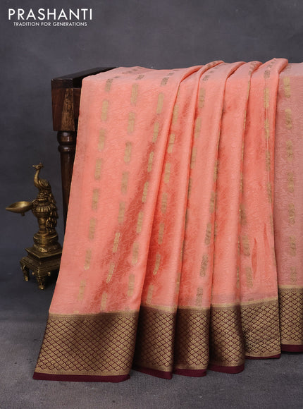 Pure mysore silk saree peach orange and coffee brown with allover self emboss & zari buttas and zari woven border