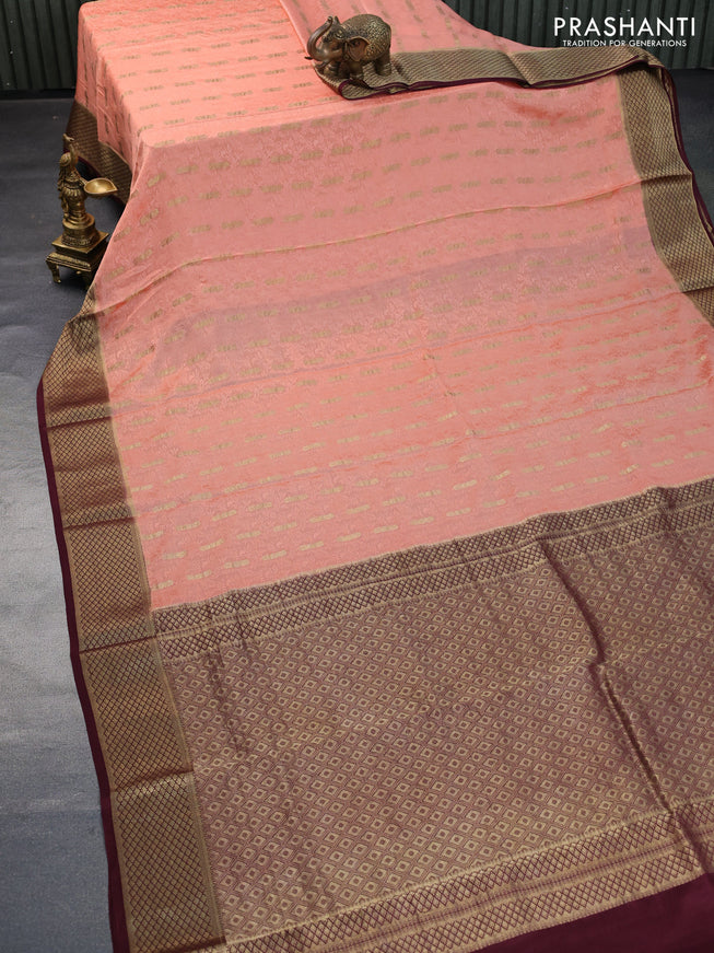 Pure mysore silk saree peach orange and coffee brown with allover self emboss & zari buttas and zari woven border