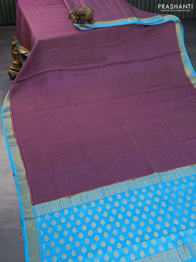 Pure mysore silk saree purple shade and cs blue with allover zari woven checked pattern and zari woven border