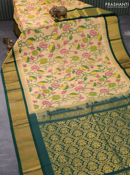 Silk cotton saree sandal and green with allover kalamkari prints and temple deisgn zari woven border