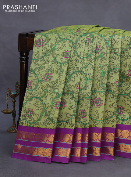 Silk cotton saree pastel green and purple with allover kalamkari prints and rettapet zari woven border