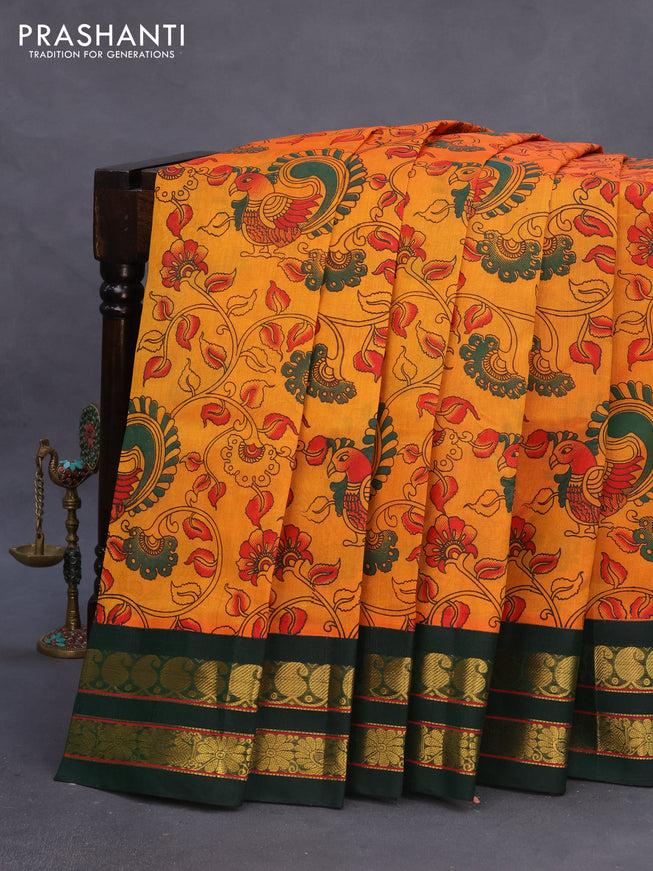 Silk cotton saree mango yellow and green with allover kalamkari prints and rettapet zari woven border