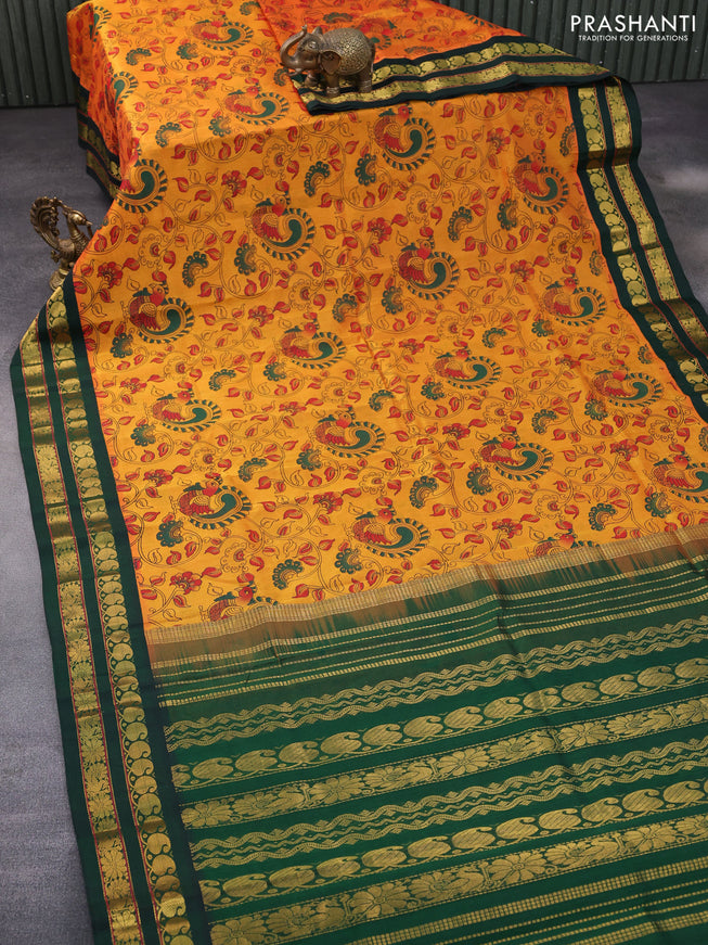 Silk cotton saree mango yellow and green with allover kalamkari prints and rettapet zari woven border