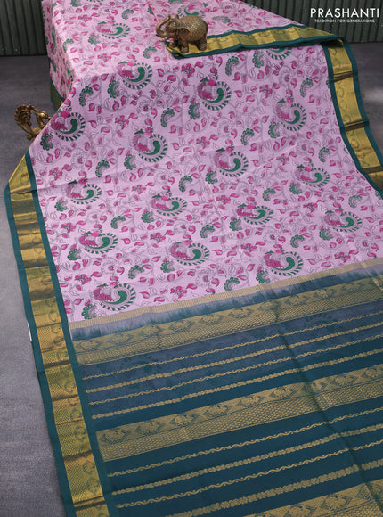 Silk cotton saree pastel pink and green with allover kalamkari prints and zari woven korvai border