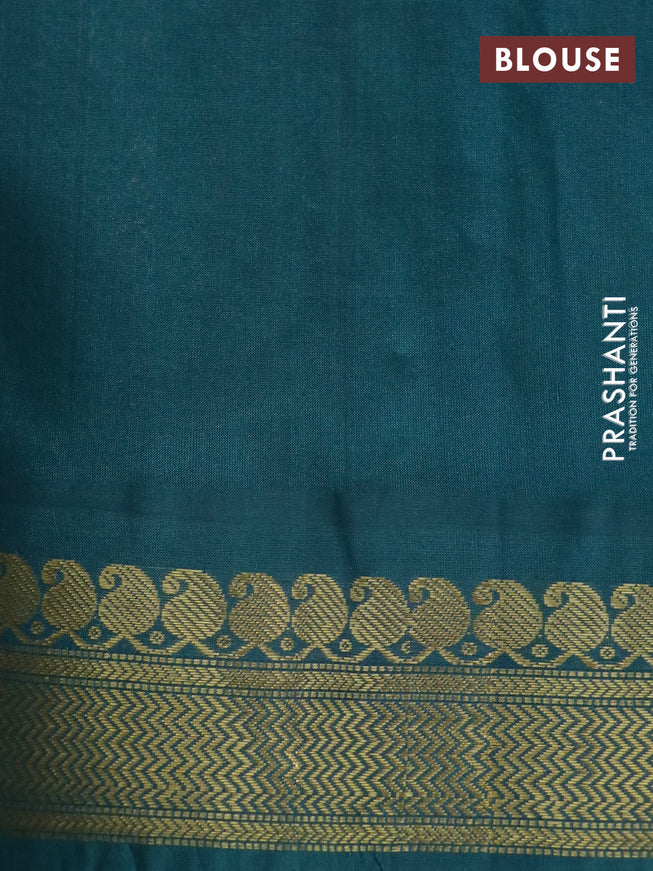 Silk cotton saree pale orange and green with allover kalamkari prints and zari woven korvai border