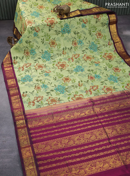 Silk cotton saree pastel green and dark magenta pink with allover kalamkari prints and zari woven korvai border