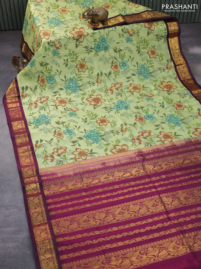 Silk cotton saree pastel green and dark magenta pink with allover kalamkari prints and zari woven korvai border