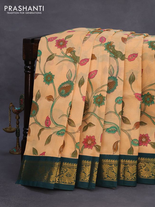 Silk cotton saree pale orange and peacock green with allover kalamkari prints and zari woven korvai border