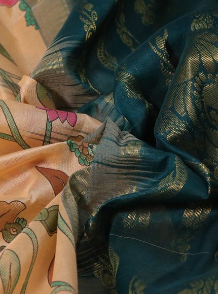 Silk cotton saree pale orange and peacock green with allover kalamkari prints and zari woven korvai border