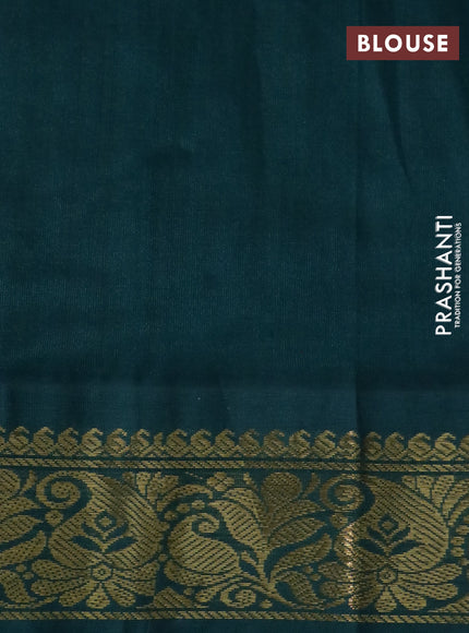 Silk cotton saree pale orange and peacock green with allover kalamkari prints and zari woven korvai border