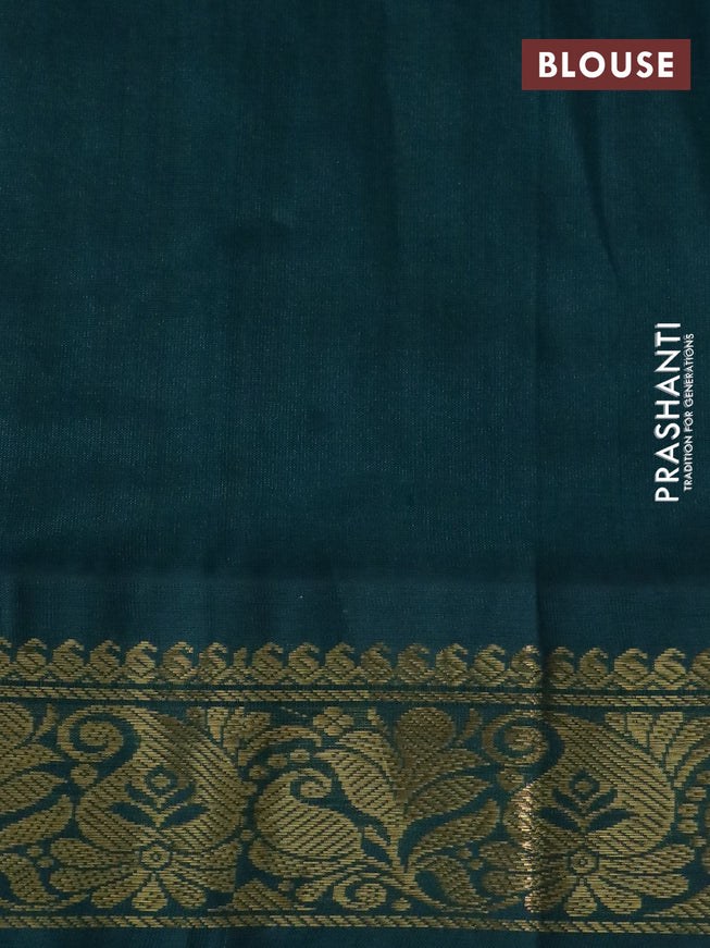 Silk cotton saree pale orange and peacock green with allover kalamkari prints and zari woven korvai border