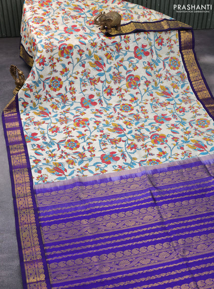 Silk cotton saree cream and blue with allover kalamkari prints and paisley zari woven korvai border