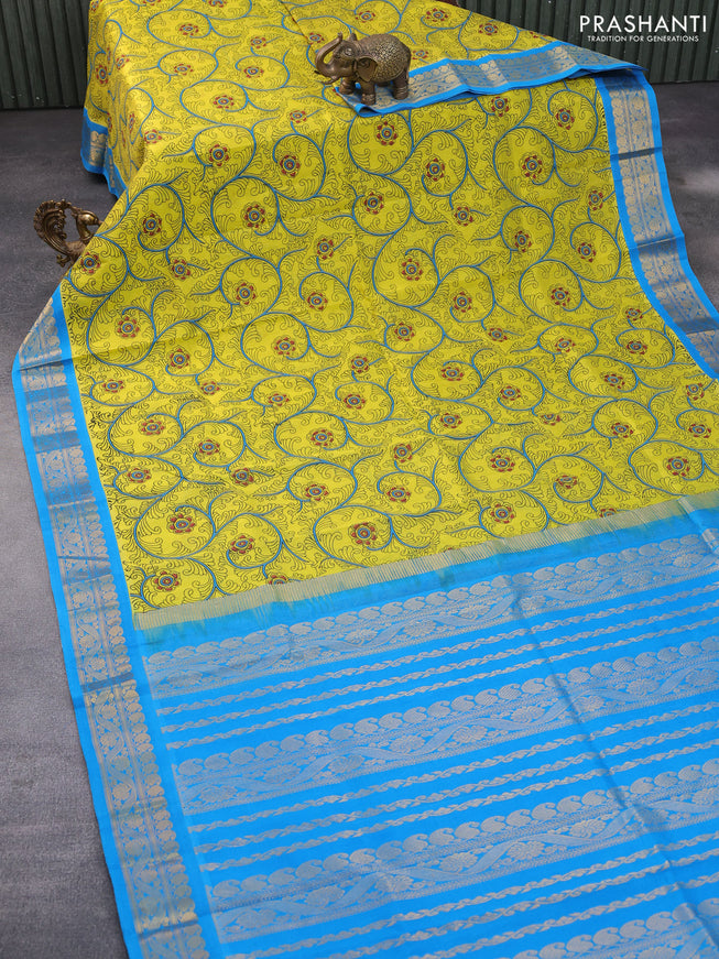 Silk cotton saree lime yellow and cs blue with allover kalamkari prints and paisley zari woven korvai border