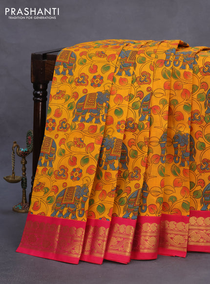 Silk cotton saree mustard yellow and pink with allover kalamkari prints and paisley zari woven korvai border