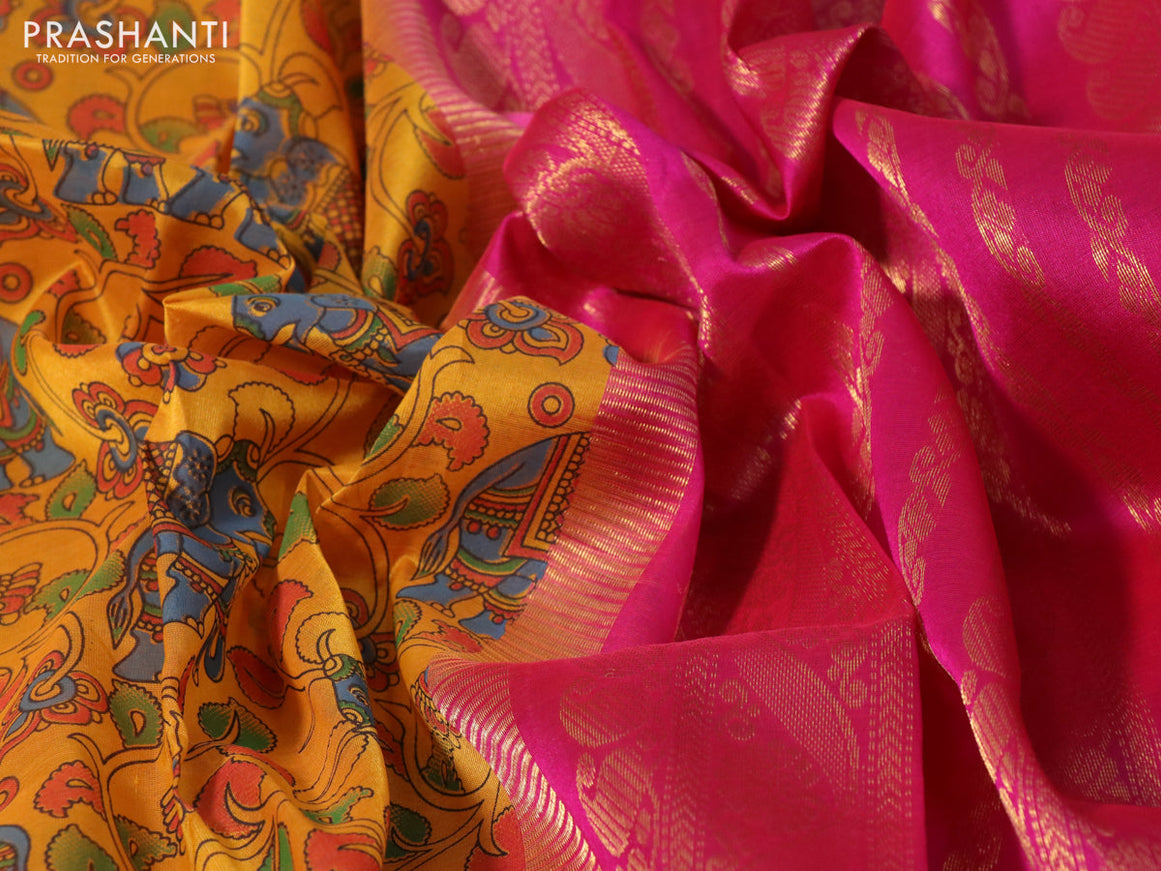 Silk cotton saree mustard yellow and pink with allover kalamkari prints and paisley zari woven korvai border