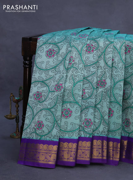 Silk cotton saree teal blue shade and blue with allover kalamkari prints and zari woven korvai border