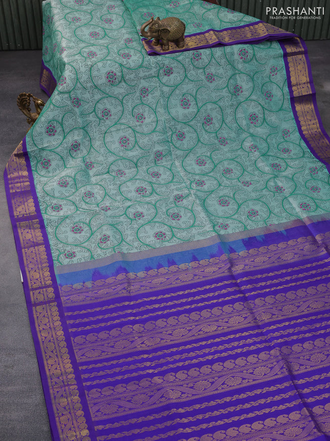 Silk cotton saree teal blue shade and blue with allover kalamkari prints and zari woven korvai border