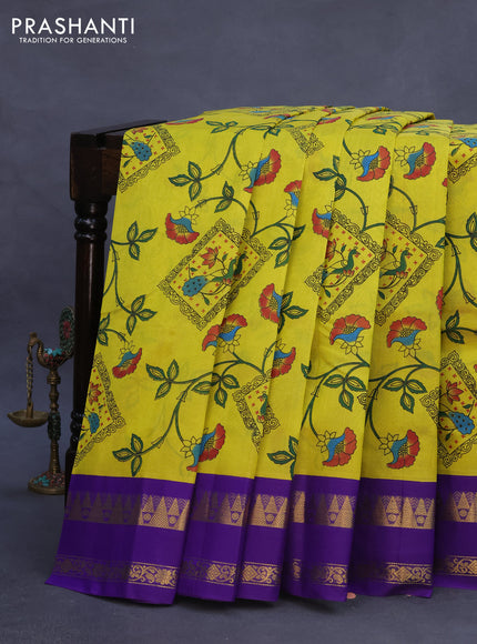 Silk cotton saree lime yellow and violet with allover kalamkari prints and rettapet zari woven korvai border