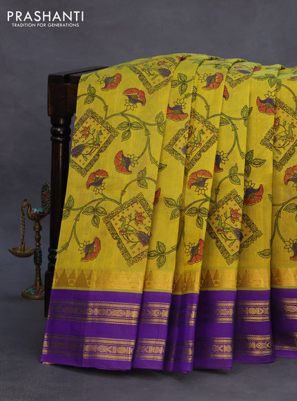 Silk cotton saree lime yellow and violet with allover kalamkari prints and rettapet zari woven korvai border