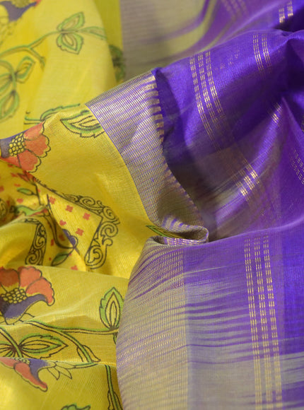 Silk cotton saree lime yellow and violet with allover kalamkari prints and rettapet zari woven korvai border