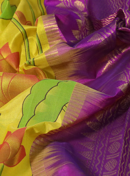 Silk cotton saree lime yellow and purple with allover kalamkari prints and rettapet zari woven korvai border