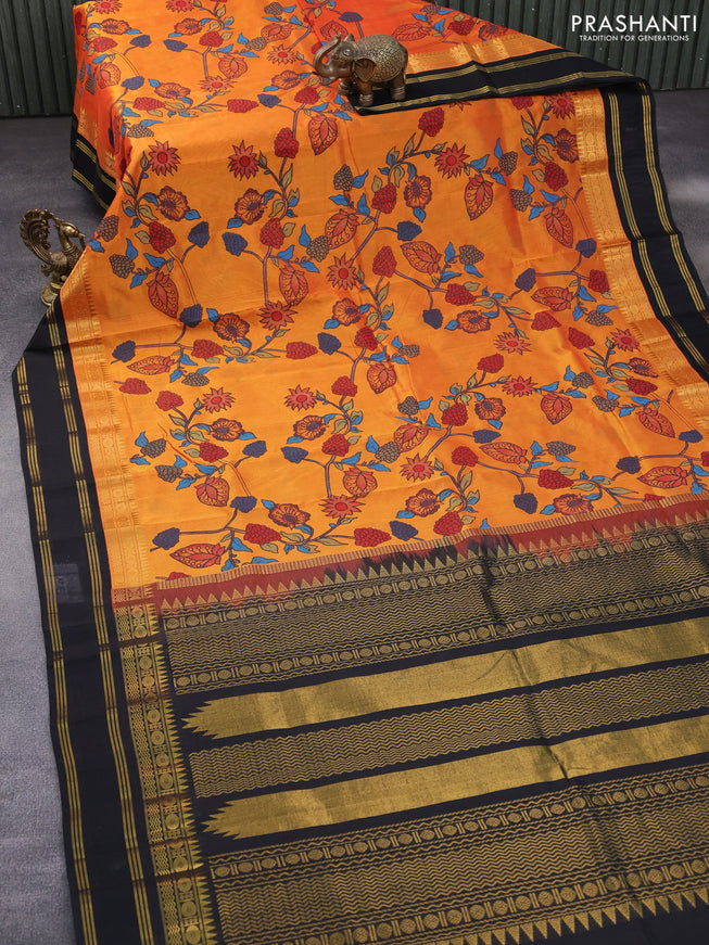 Silk cotton saree orange and black with allover kalamkari prints and rettapet zari woven korvai border