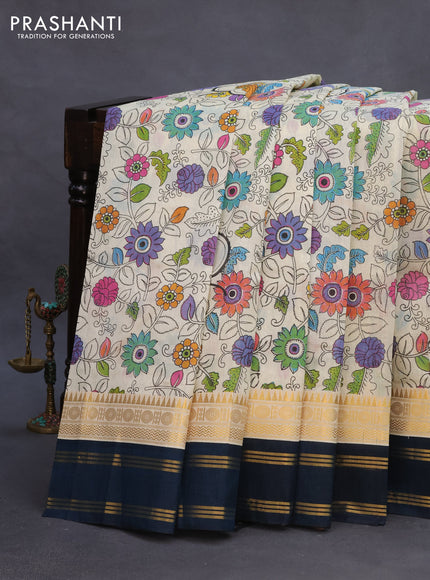 Silk cotton saree cream and peacock blue with allover kalamkari prints and rettapet zari woven korvai border