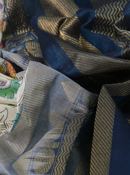 Silk cotton saree cream and peacock blue with allover kalamkari prints and rettapet zari woven korvai border