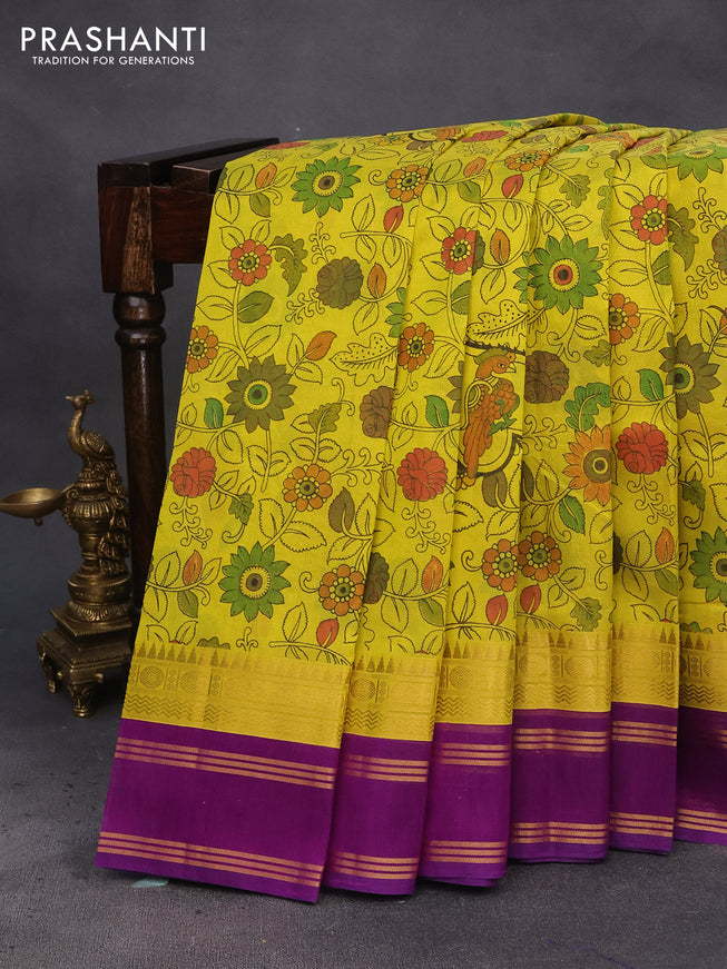 Silk cotton saree lime yellow and purple with allover kalamkari prints and rettapet zari woven korvai border