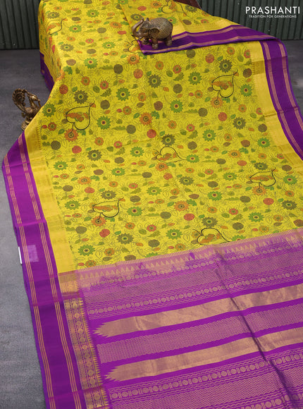 Silk cotton saree lime yellow and purple with allover kalamkari prints and rettapet zari woven korvai border