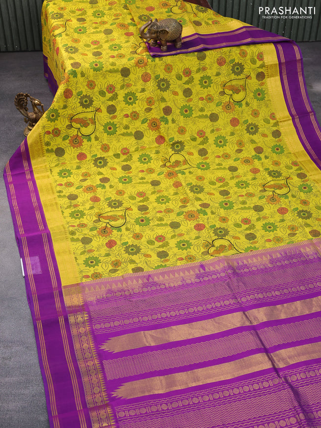 Silk cotton saree lime yellow and purple with allover kalamkari prints and rettapet zari woven korvai border