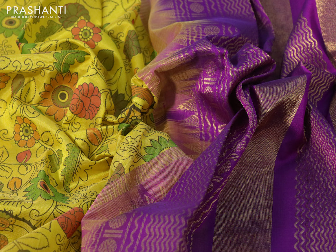 Silk cotton saree lime yellow and purple with allover kalamkari prints and rettapet zari woven korvai border