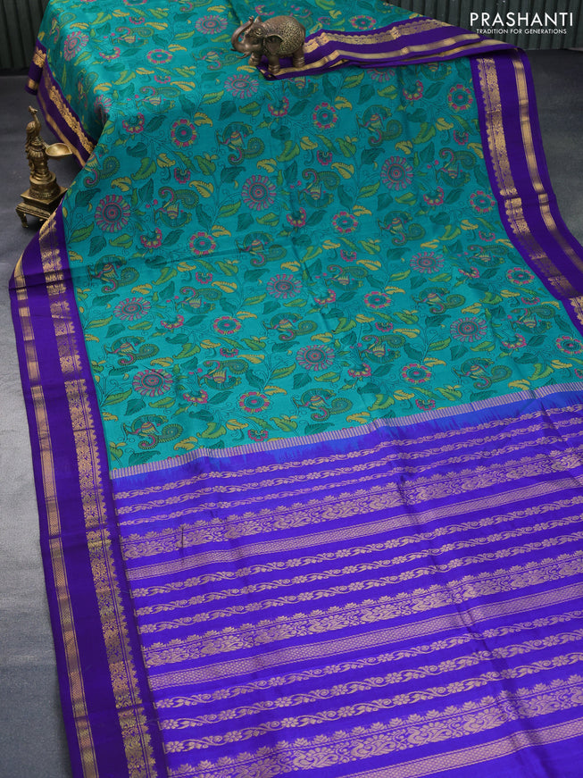 Silk cotton saree teal green and blue with allover kalamkari prints and rettapet zari woven korvai border