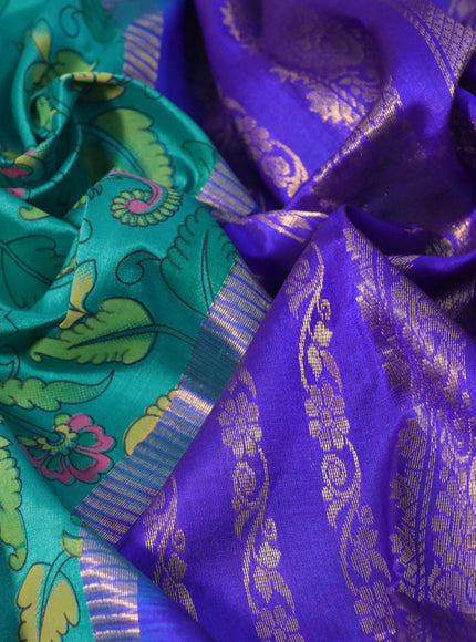 Silk cotton saree teal green and blue with allover kalamkari prints and rettapet zari woven korvai border