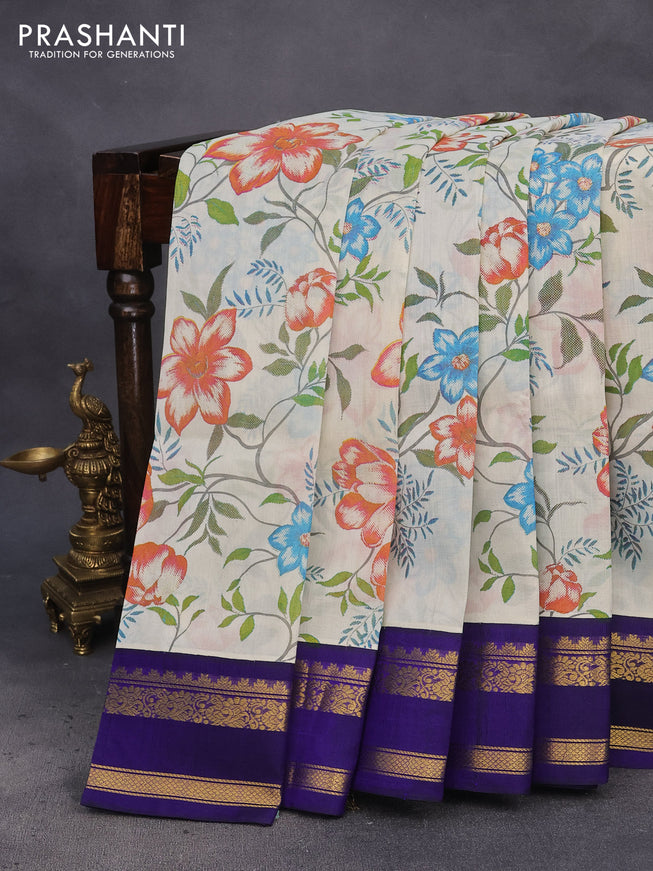 Silk cotton saree cream and blue with allover kalamkari prints and rettapet zari woven korvai border