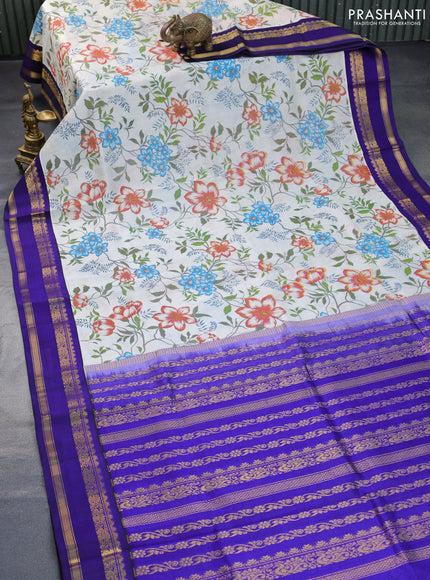 Silk cotton saree cream and blue with allover kalamkari prints and rettapet zari woven korvai border