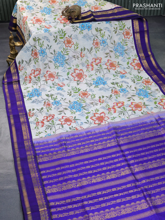 Silk cotton saree cream and blue with allover kalamkari prints and rettapet zari woven korvai border