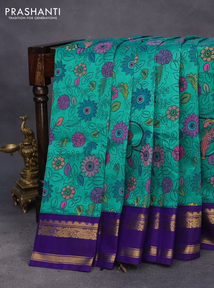 Silk cotton saree teal green and blue with allover kalamkari prints and rettapet zari woven korvai border