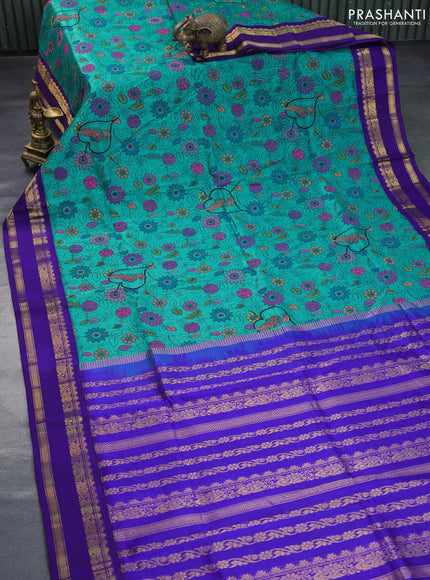 Silk cotton saree teal green and blue with allover kalamkari prints and rettapet zari woven korvai border