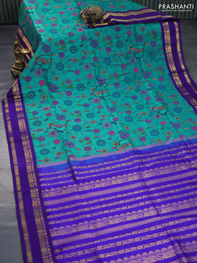 Silk cotton saree teal green and blue with allover kalamkari prints and rettapet zari woven korvai border