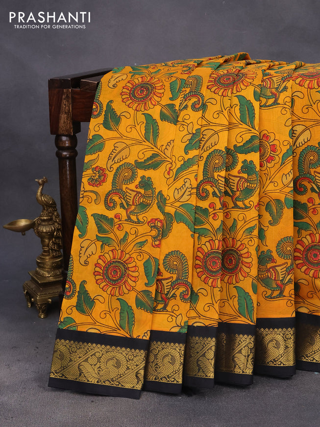 Silk cotton saree mustard yellow and black with allover kalamkari prints and zari woven korvai border