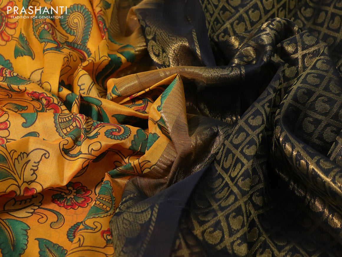 Silk cotton saree mustard yellow and black with allover kalamkari prints and zari woven korvai border