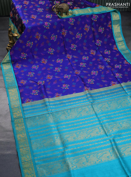 Silk cotton saree blue and teal blue with allover kalamkari prints and zari woven korvai border