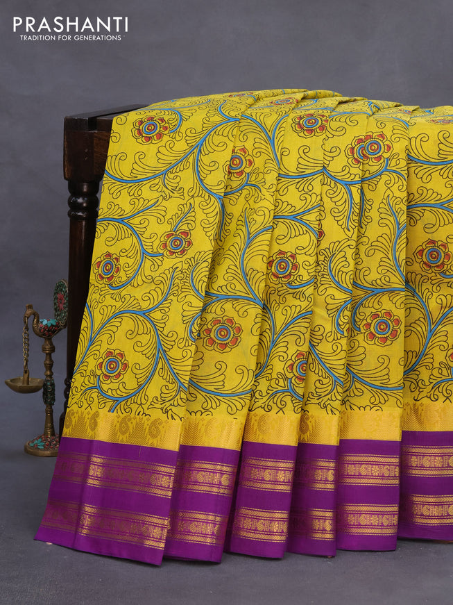 Silk cotton saree lime yellow and purple with allover kalamkari prints and rettapet zari woven korvai border